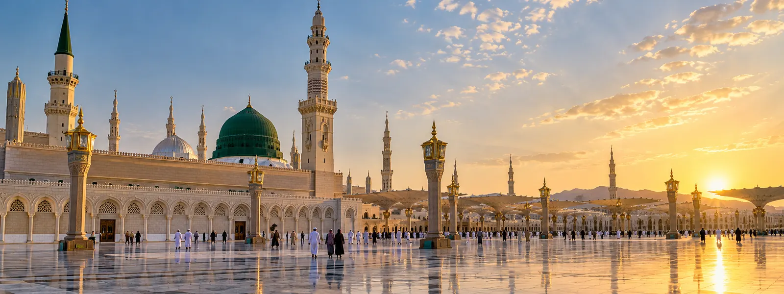 The courtyard of Masjid an-Nabawi in Madinah at golden hour